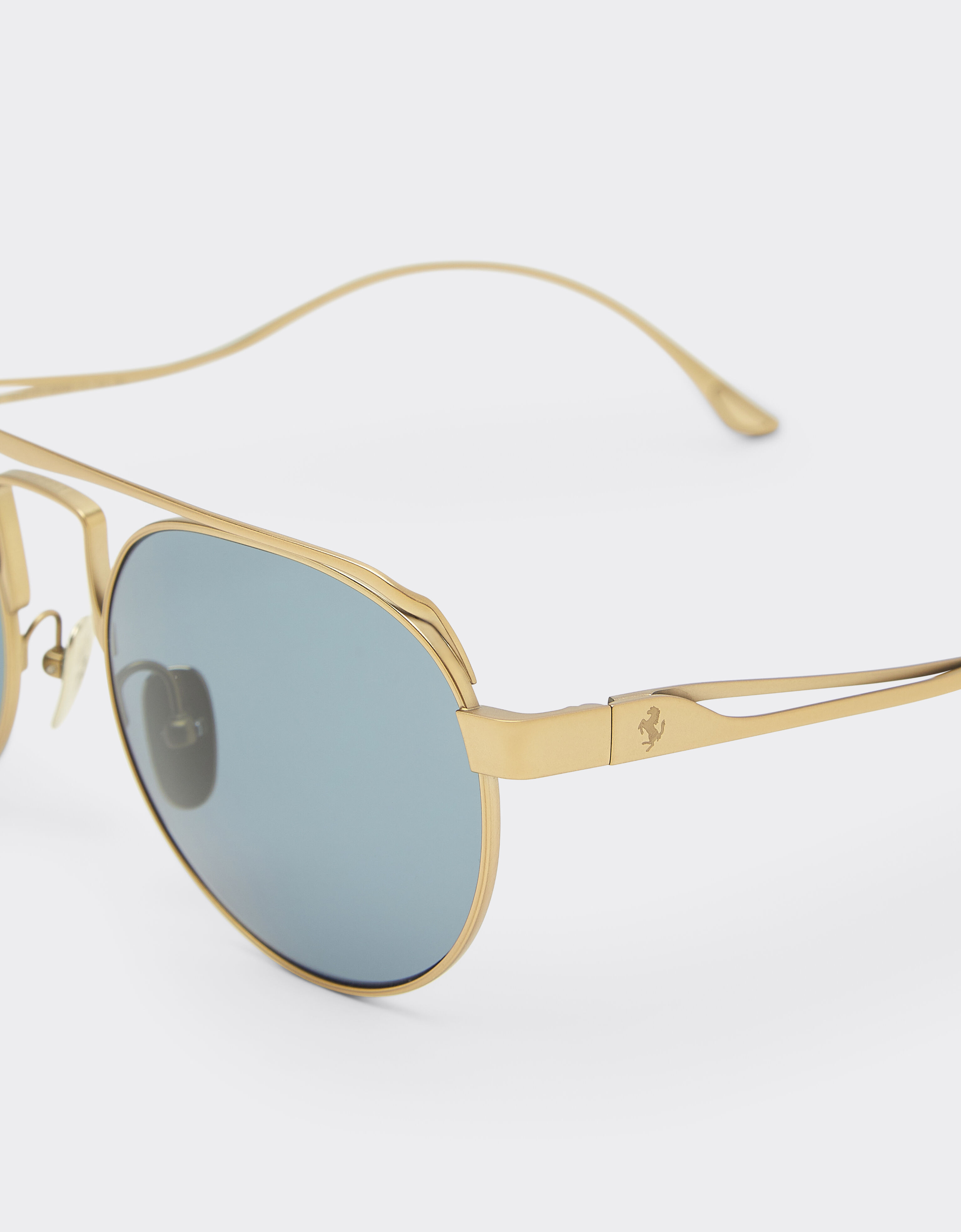 Ferrari Ferrari sunglasses in matte gold titanium with blue lenses Gold LA0EOf